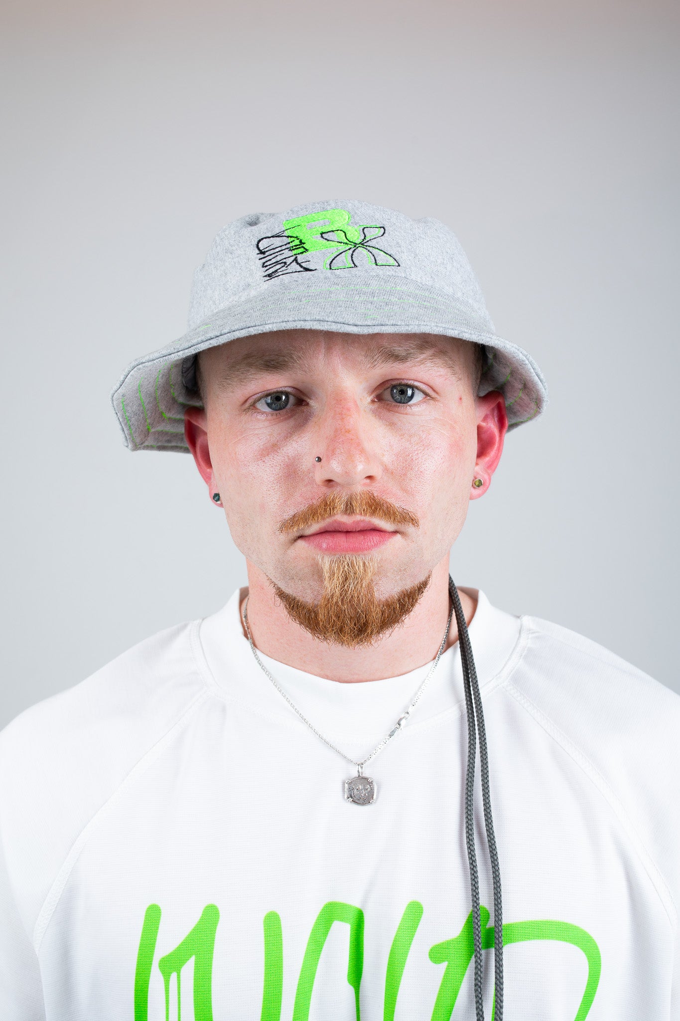 Bellisa X Lucid Independent Bristol Fashion Brand Summer Streetwear Style Festival Look Graffiti X Neon green contrast stitch grey joggers and matching Bucket Hat 2-Piece
