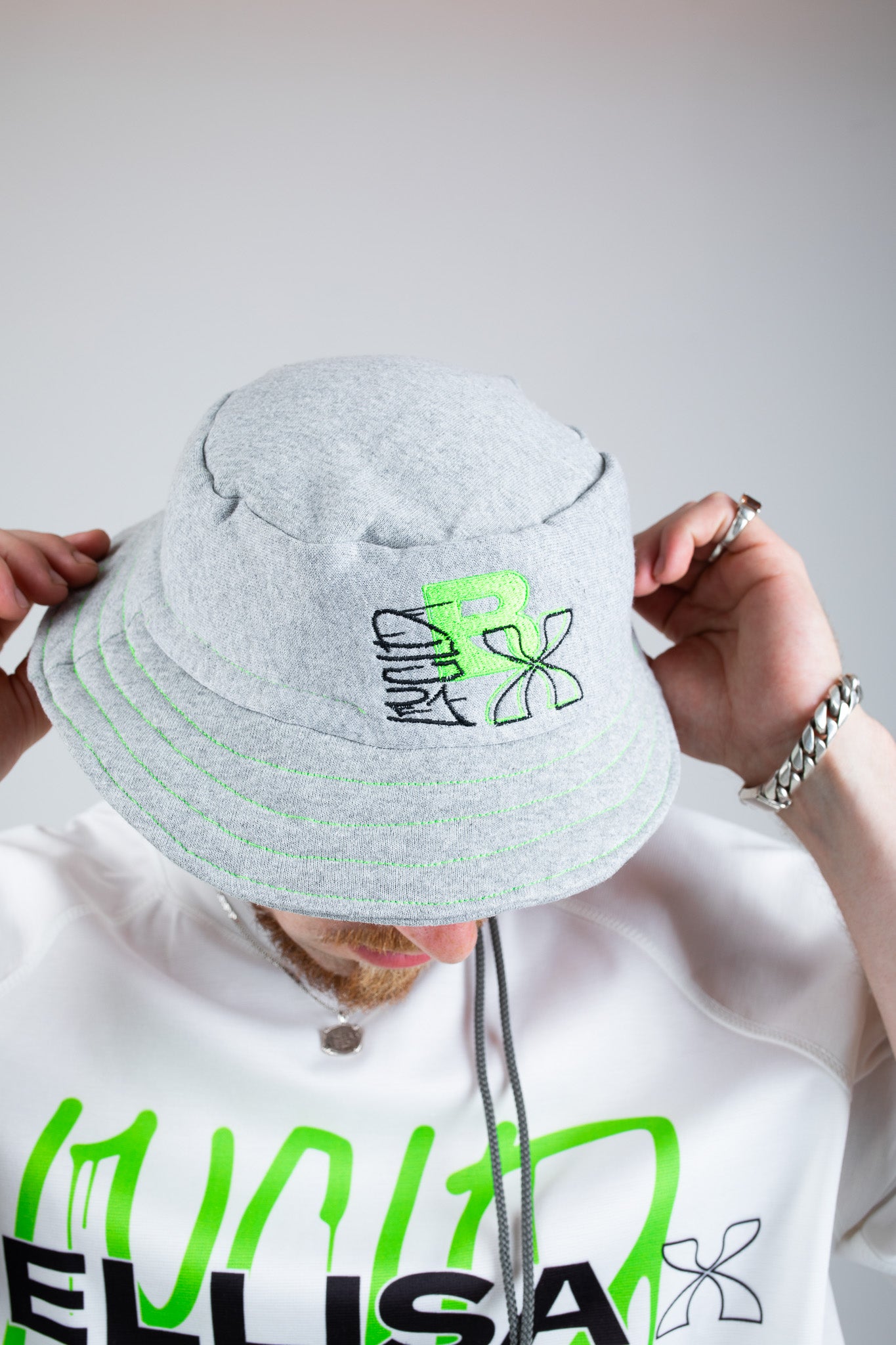 Bellisa X Lucid Independent Bristol Fashion Brand Summer Streetwear Style Festival Look Graffiti X Neon green contrast stitch grey joggers and matching Bucket Hat 2-Piece