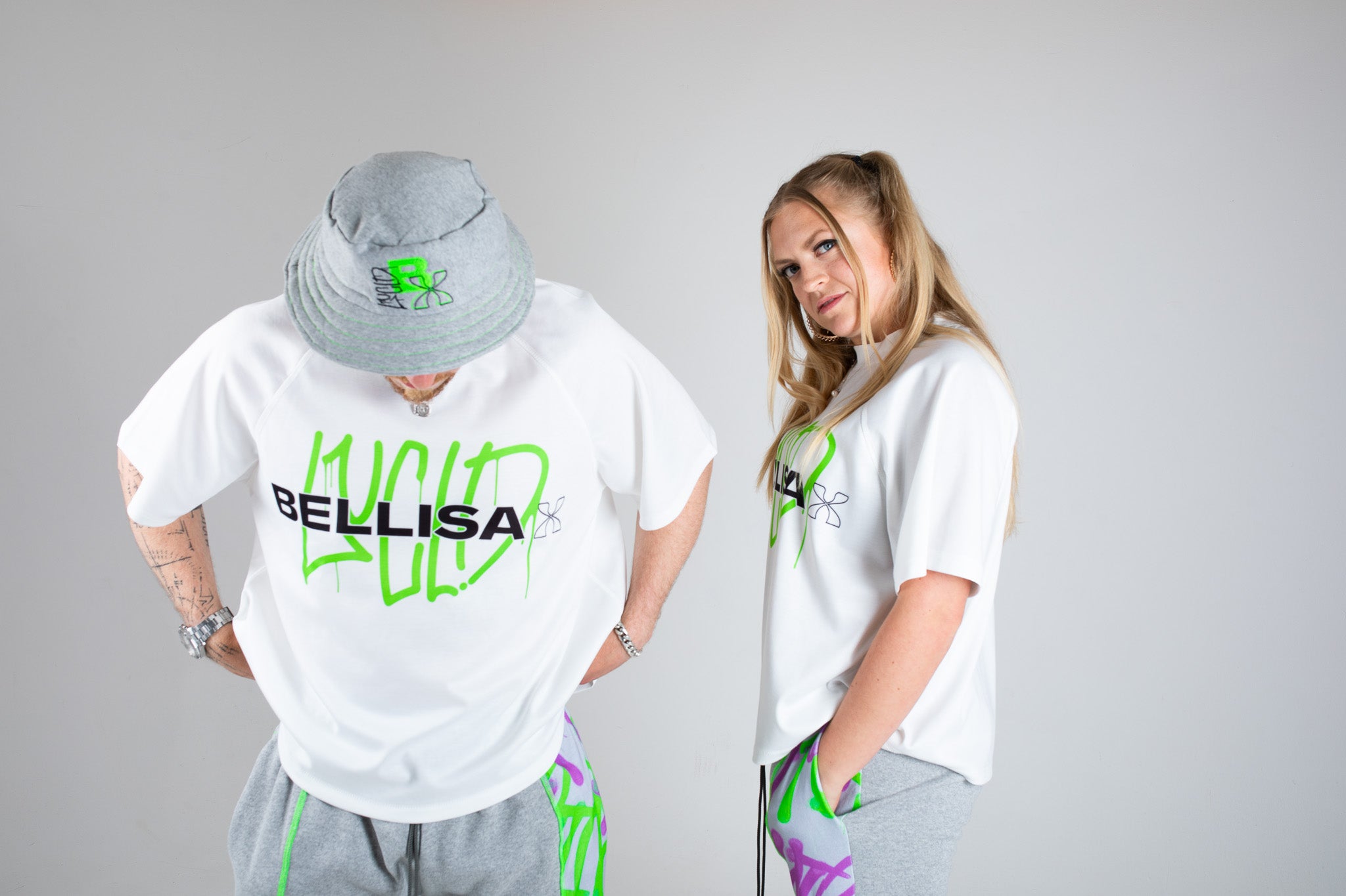 Bellisa X Lucid Independent Bristol Fashion Brand Summer Streetwear Style Festival Look Graffiti X Neon green contrast stitch grey joggers and matching Bucket Hat 2-Piece