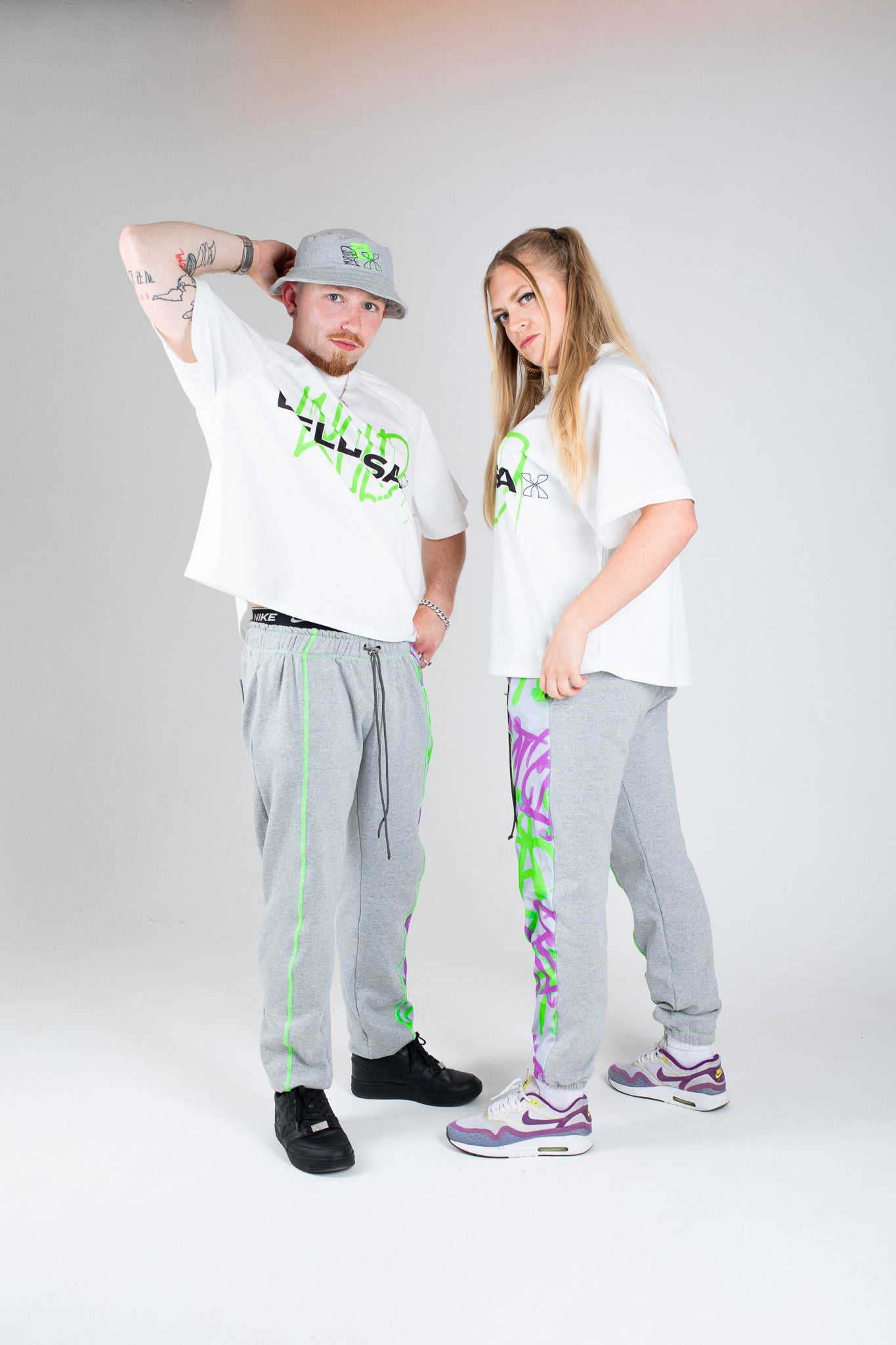 Bellisa X Lucid Independent Bristol Fashion Brand Summer Streetwear Style Festival Look Graffiti X Neon green contrast stitch grey joggers and matching Bucket Hat 2-Piece