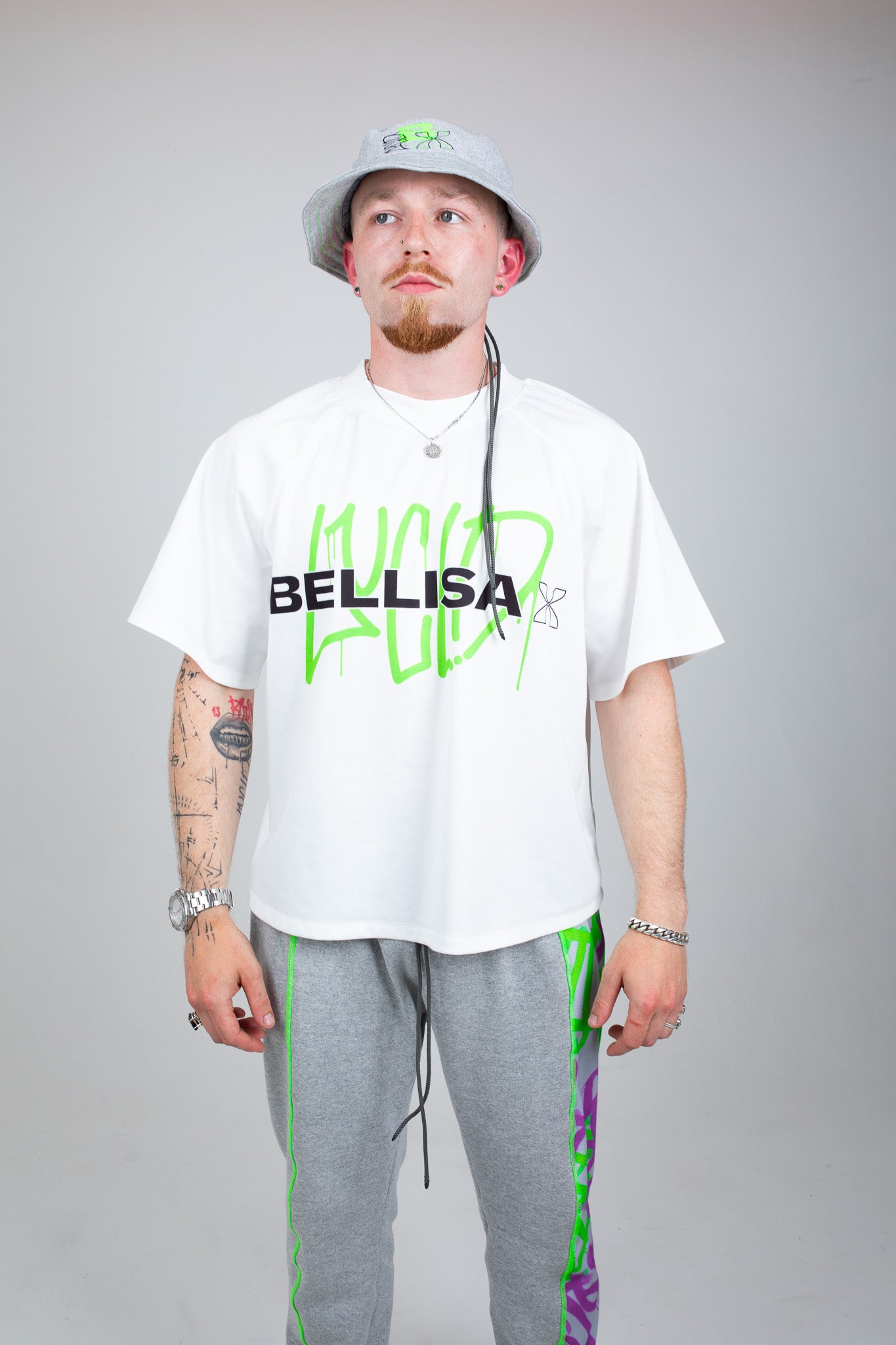 Bellisa X Lucid Independent Bristol Fashion Brand Summer Streetwear Style Festival Look Graffiti X Neon green contrast stitch grey joggers and matching Bucket Hat 2-Piece