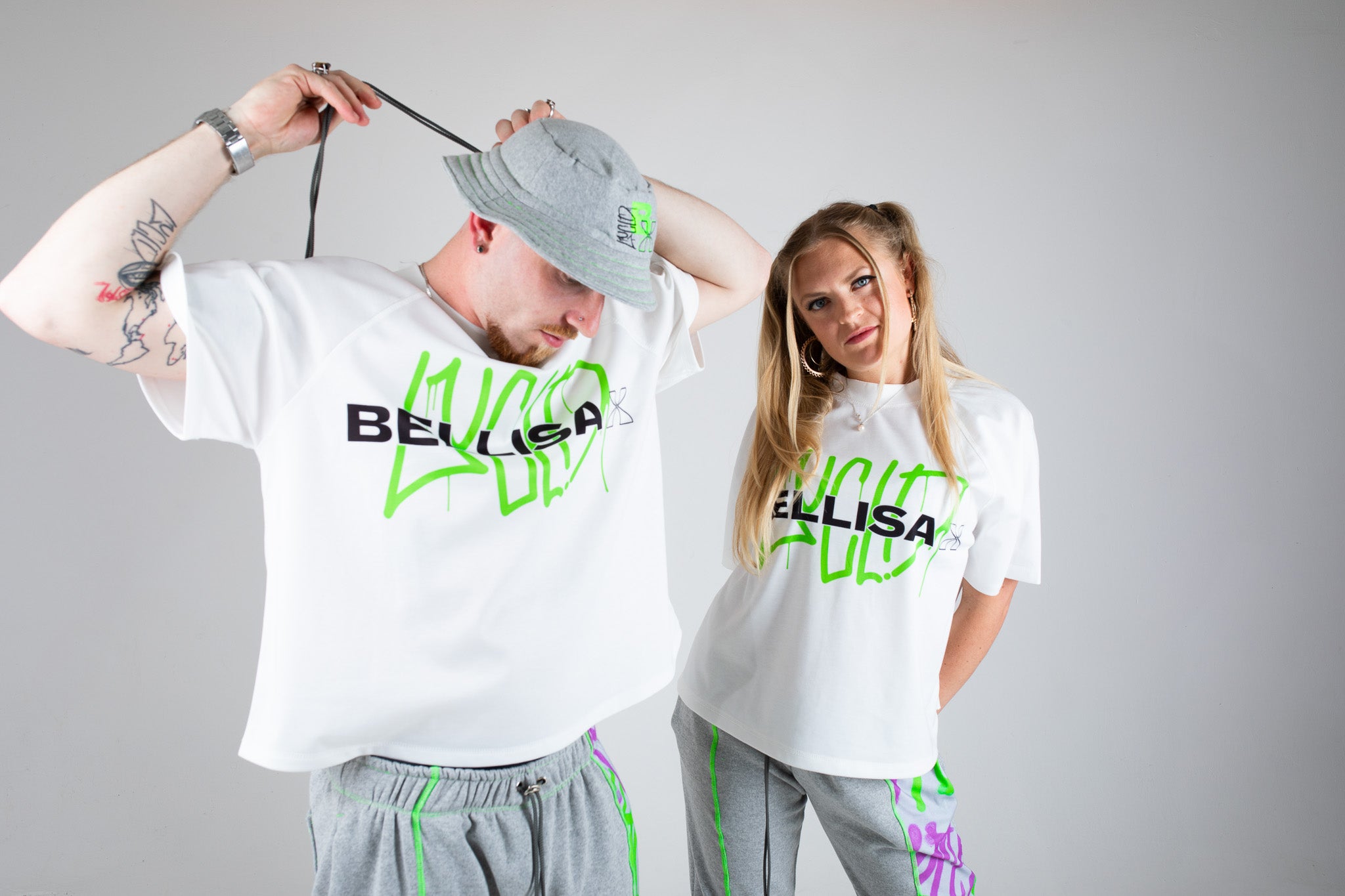 Bellisa X Lucid Independent Bristol Fashion Brand Summer Streetwear Style Festival Look Graffiti X Neon green contrast stitch grey joggers and matching Bucket Hat 2-Piece