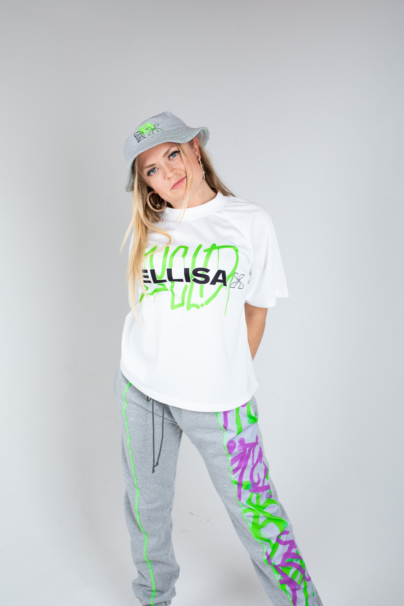 Bellisa X Lucid Independent Bristol Fashion Brand Summer Streetwear Style Festival Look Graffiti X Neon green contrast stitch grey joggers and matching Bucket Hat 2-Piece