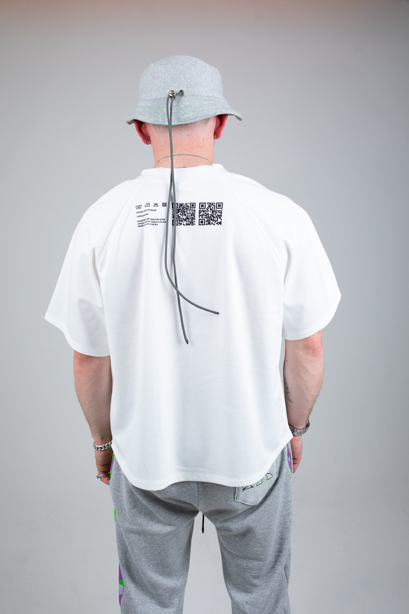 Bellisa X Lucid Independent Bristol Fashion Brand Summer Streetwear Style Festival Look Graffiti X Neon green contrast stitch grey joggers and matching Bucket Hat 2-Piece