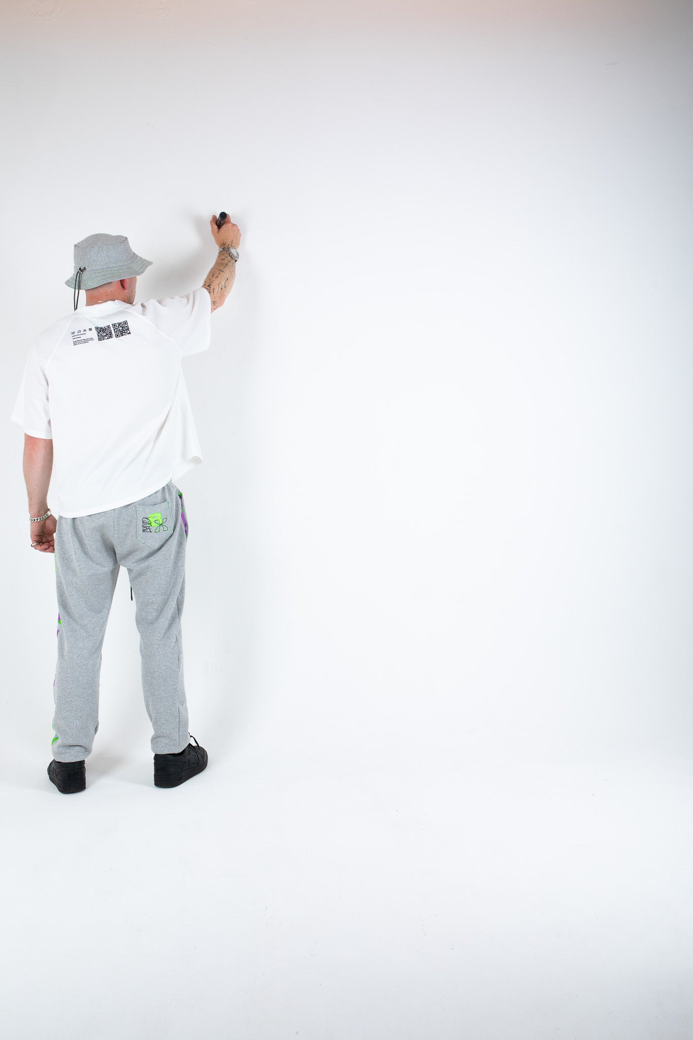 Bellisa X Lucid Independent Bristol Fashion Brand Summer Streetwear Style Festival Look Graffiti X Neon green contrast stitch grey joggers and matching Bucket Hat 2-Piece