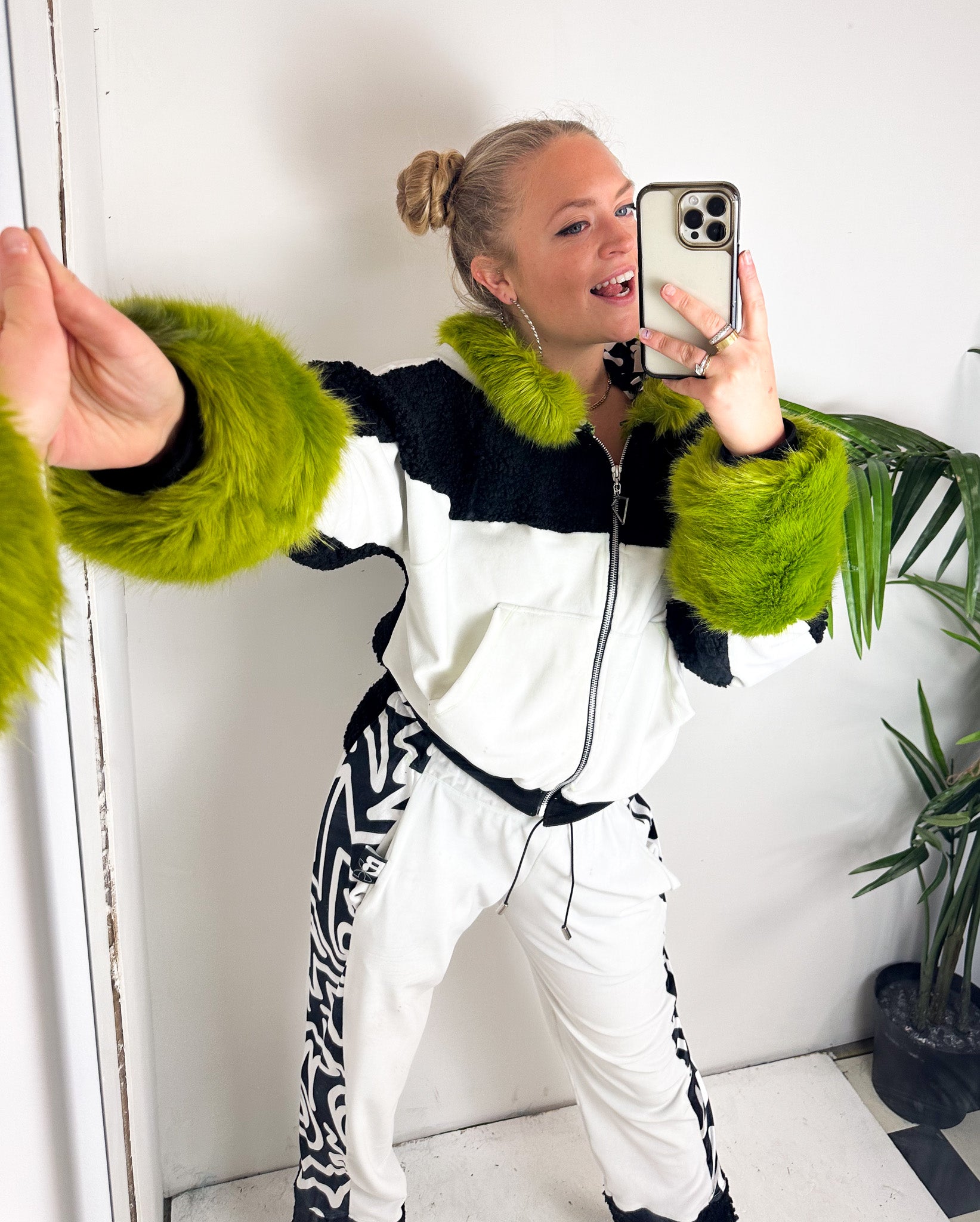 Independent fashion designers wears unique tracksuit: Bellisa X White and Black Velour Cropped Hoodie with Lime Green Faux Fur Cuffs and Hood. Unique summer fashion hoodie