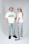 Bellisa X Lucid Independent Bristol Fashion Brand Summer Streetwear Style Festival Look Graffiti X Neon green contrast stitch grey joggers and matching Bucket Hat 2-Piece 