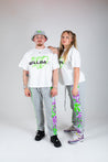 Bellisa X Lucid Independent Bristol Fashion Brand Summer Streetwear Style Festival Look Graffiti X Neon green contrast stitch grey joggers and matching Bucket Hat 2-Piece 