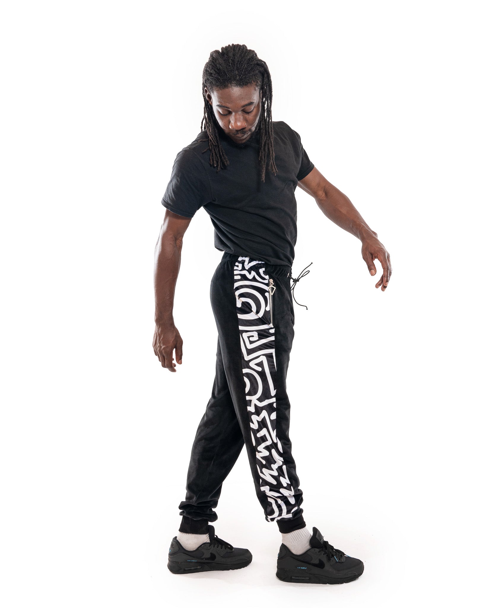 black velour tracksuit bottoms with holly mingo abstract print. Bellisa X Clothing